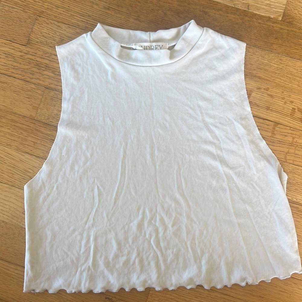 Shell cream color muscle Tank purchased from a small boutique brand name AUDREY